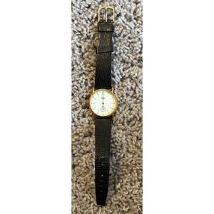 VTG Timex T Cell Quartz Gold Case Black Leather Band Water Resistant Watch WMN